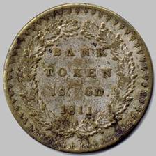 A picture containing object, coin, wall

Description automatically generated