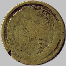 A close-up of a coin

Description automatically generated